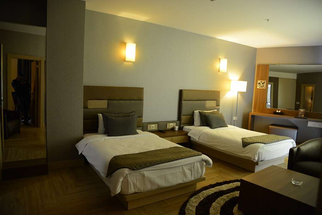 Titanic Hotel & Spa Sulaymaniyah ห้อง รูปภาพ A room at the hotel
